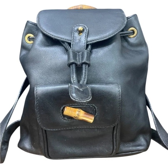 Gucci Other - Gucci Black Leather Backpack with Gold Accents